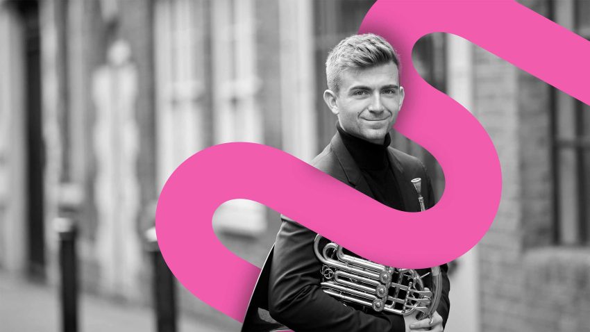 Black and white image of a man holding a french horn with a pink graphic swirling behind him.