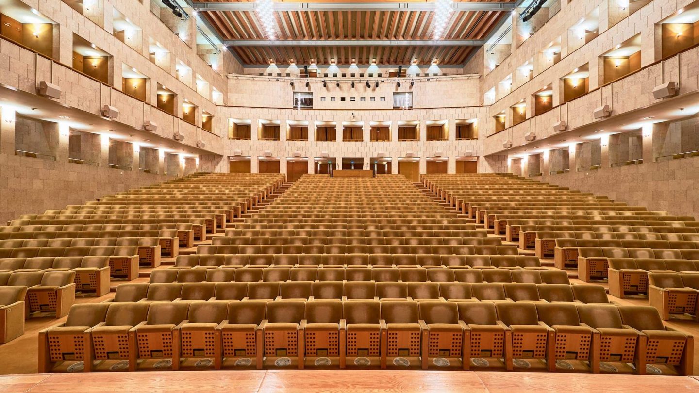 An empty modern concert hall.