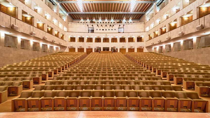 An empty modern concert hall.