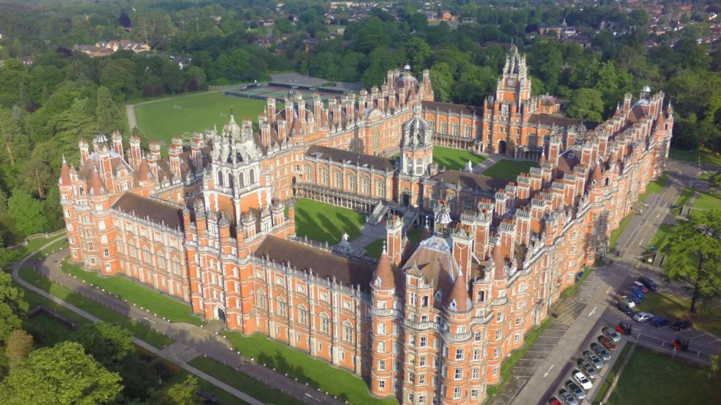 Large ornate French Renaissance style red brick building.