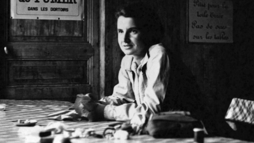 An old black and white photo of a woman.